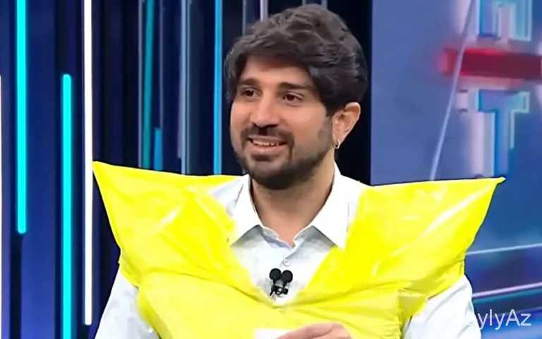 Efirə sellofan geyinib çıxdı 
							 – Foto